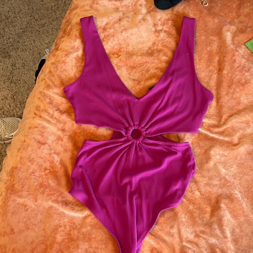 Pink body suit